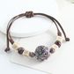 🌿 BEGRÄNSAD TID: 50 % RABATT! ✨ Justerbart armband med keramiska pärlor – etniskt, boho, glidande knut 🔮